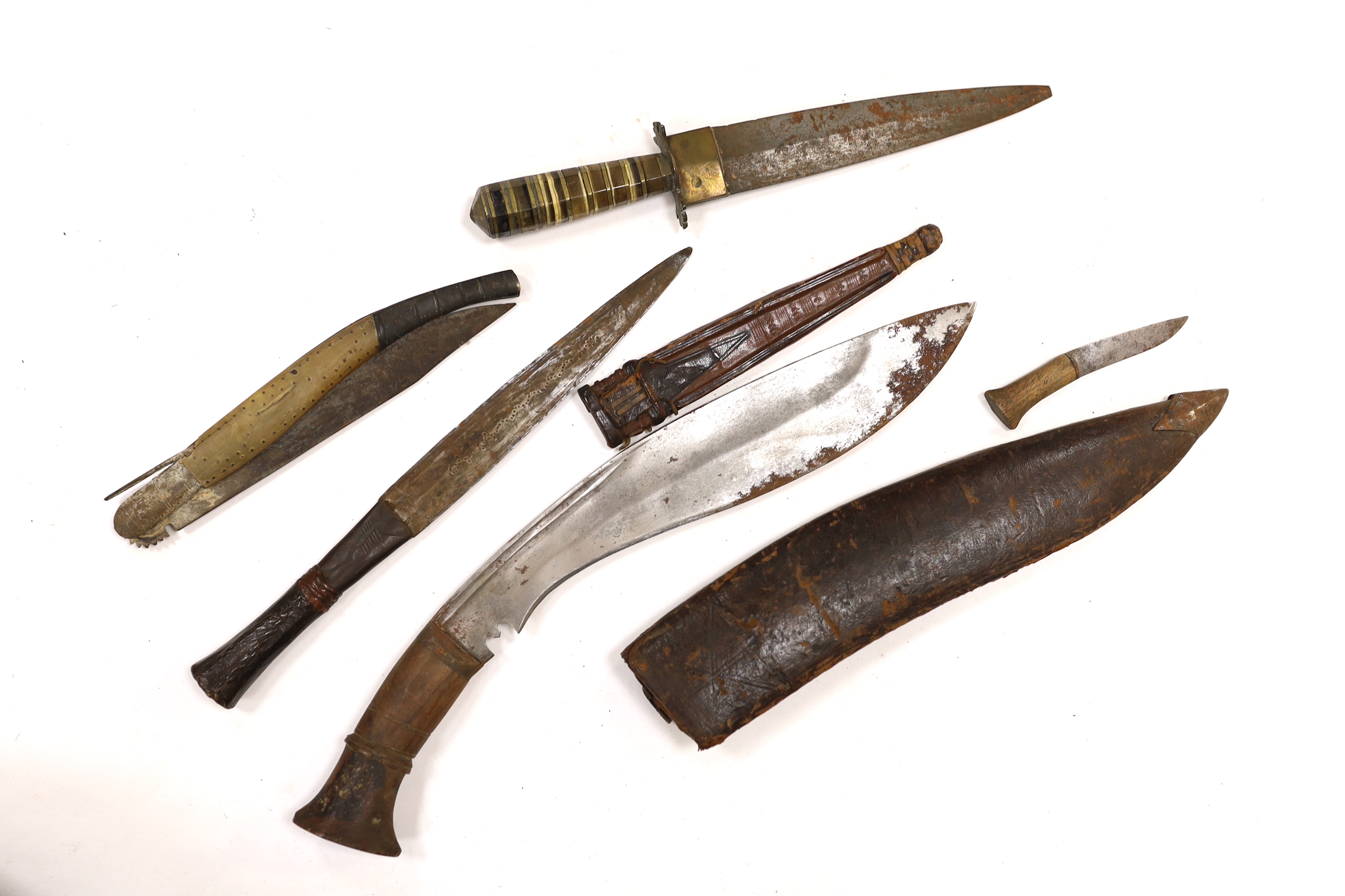 A 19th century Japanese katana with signature to the tang, with chiselled bronze tsuba and gilt metal menuki, and six various knives, blade 57cm
